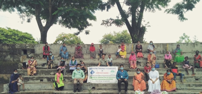 Members of Assisi Centre for Integrated Development with officials on September 8. (Photo Courtesy: ACID)